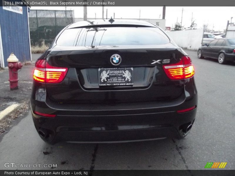 Black Sapphire Metallic / Chateau Red 2011 BMW X6 xDrive35i