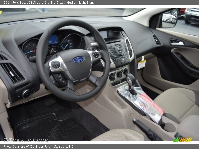 Sterling Gray / Medium Light Stone 2014 Ford Focus SE Sedan