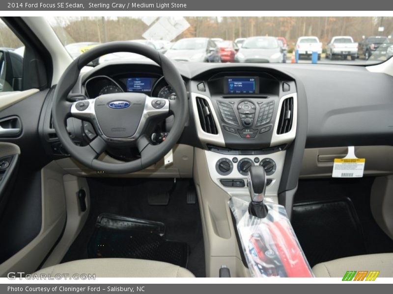 Sterling Gray / Medium Light Stone 2014 Ford Focus SE Sedan