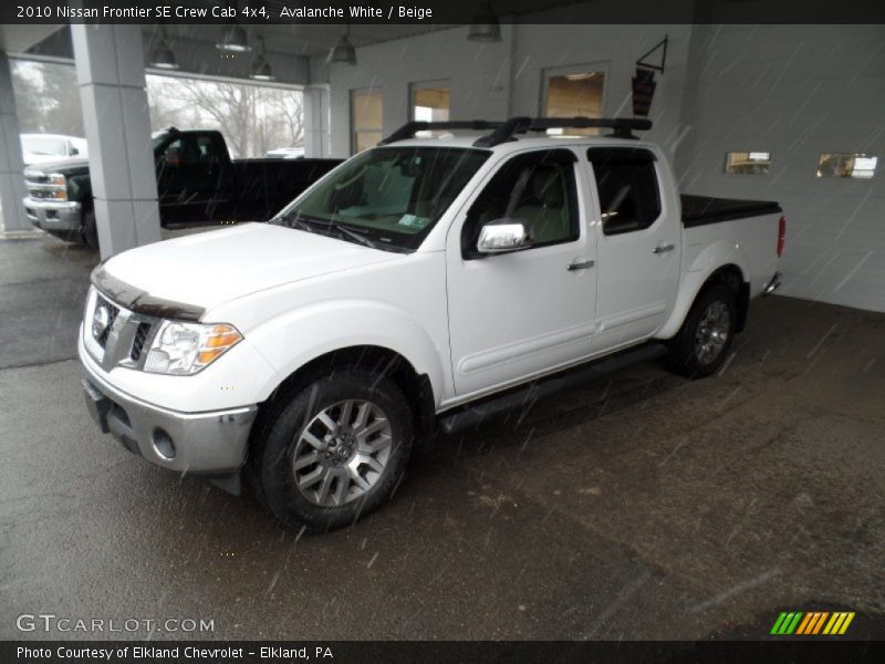 Avalanche White / Beige 2010 Nissan Frontier SE Crew Cab 4x4