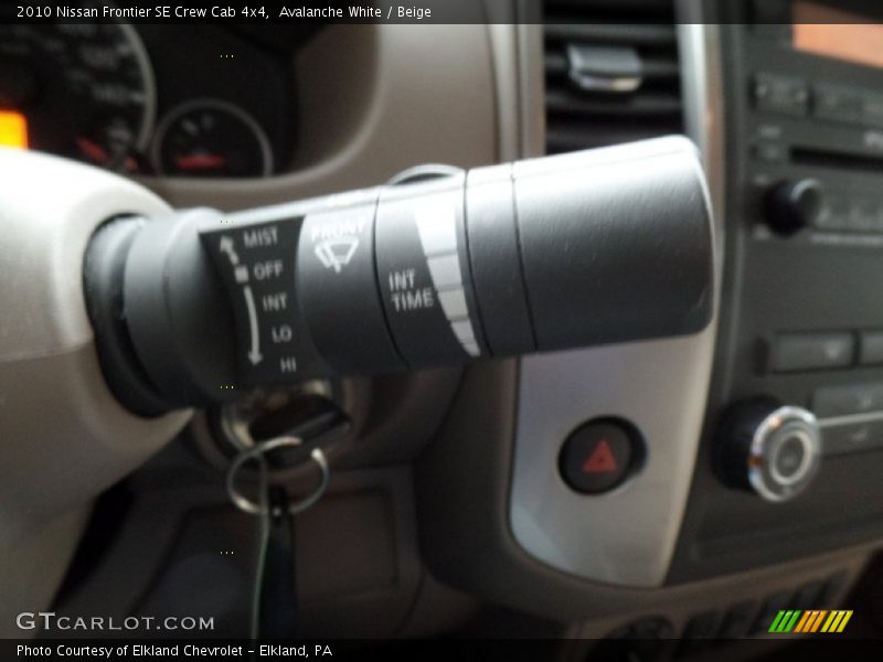 Avalanche White / Beige 2010 Nissan Frontier SE Crew Cab 4x4
