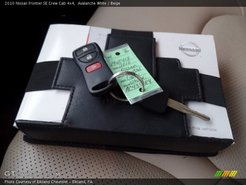 Avalanche White / Beige 2010 Nissan Frontier SE Crew Cab 4x4