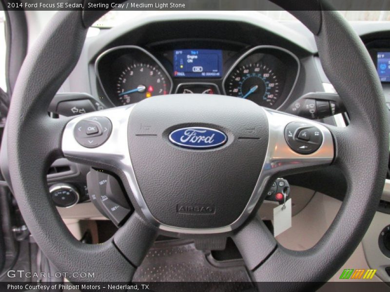 Sterling Gray / Medium Light Stone 2014 Ford Focus SE Sedan