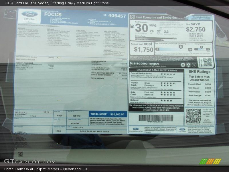 Sterling Gray / Medium Light Stone 2014 Ford Focus SE Sedan