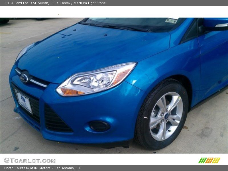 Blue Candy / Medium Light Stone 2014 Ford Focus SE Sedan
