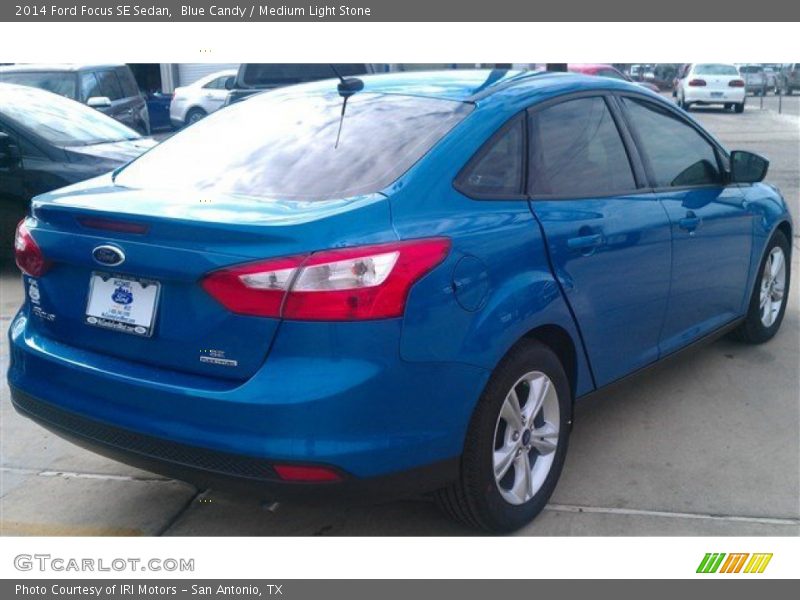 Blue Candy / Medium Light Stone 2014 Ford Focus SE Sedan