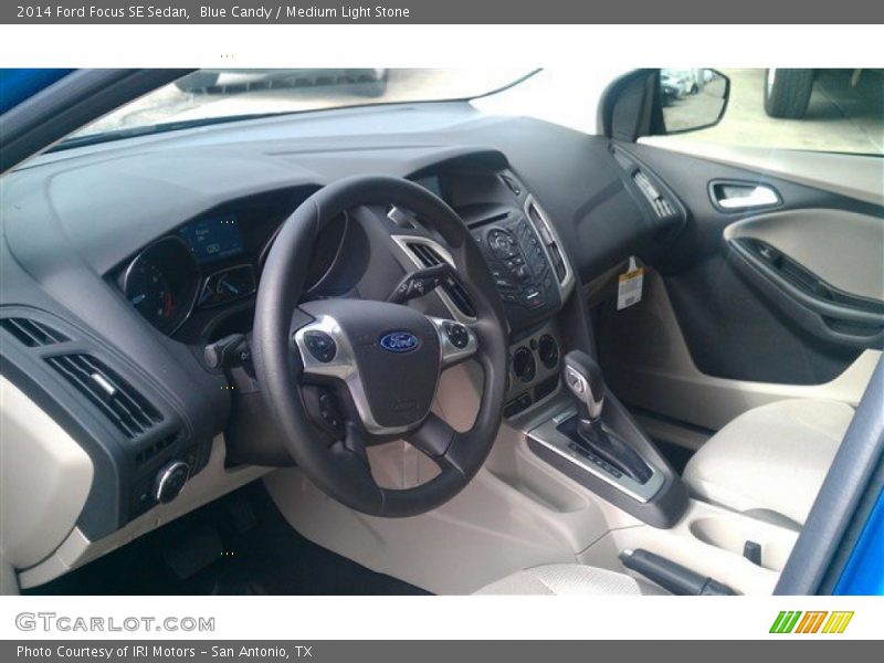 Blue Candy / Medium Light Stone 2014 Ford Focus SE Sedan