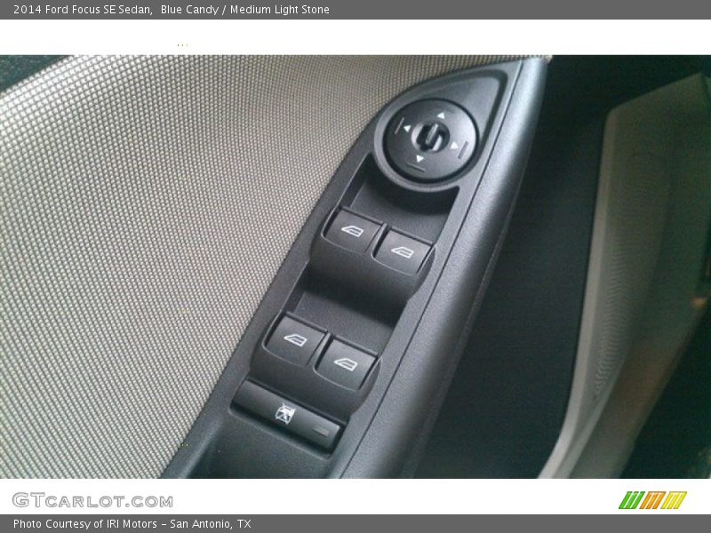 Blue Candy / Medium Light Stone 2014 Ford Focus SE Sedan