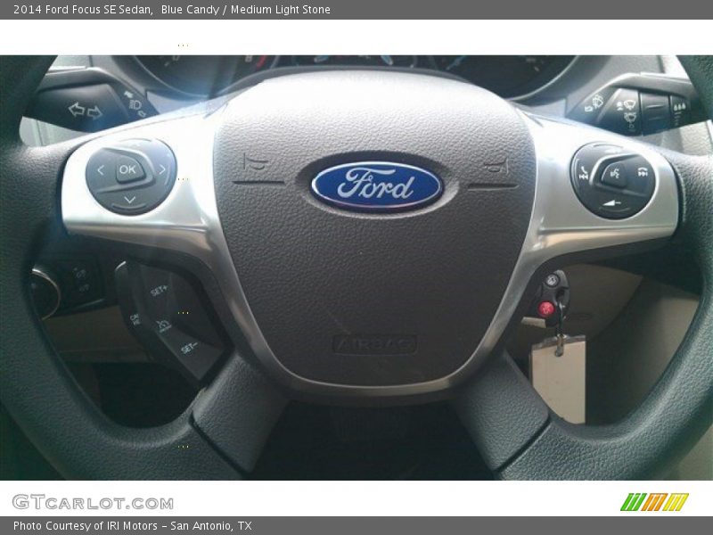 Blue Candy / Medium Light Stone 2014 Ford Focus SE Sedan