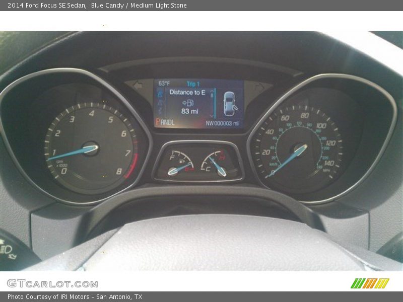Blue Candy / Medium Light Stone 2014 Ford Focus SE Sedan