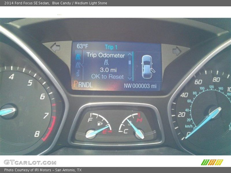 Blue Candy / Medium Light Stone 2014 Ford Focus SE Sedan