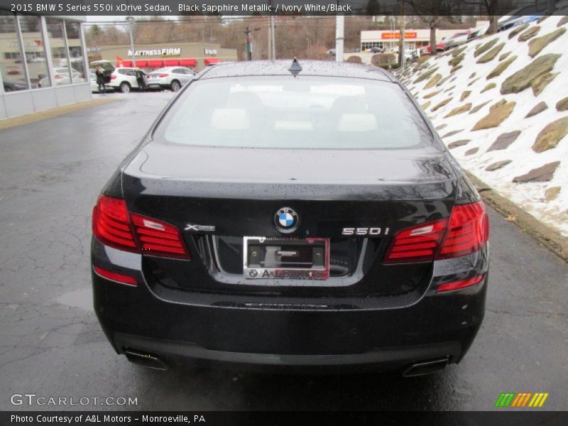 Black Sapphire Metallic / Ivory White/Black 2015 BMW 5 Series 550i xDrive Sedan