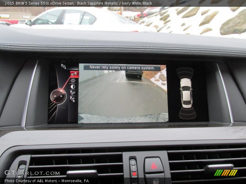 Black Sapphire Metallic / Ivory White/Black 2015 BMW 5 Series 550i xDrive Sedan