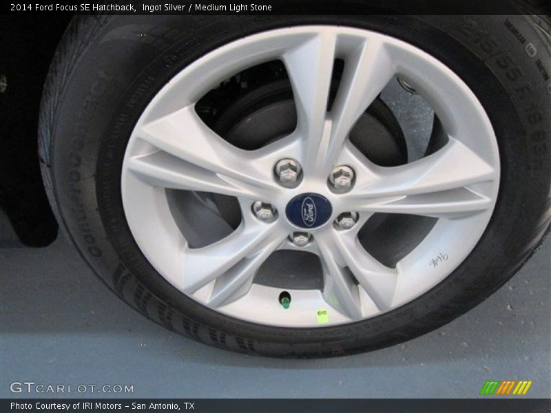 Ingot Silver / Medium Light Stone 2014 Ford Focus SE Hatchback