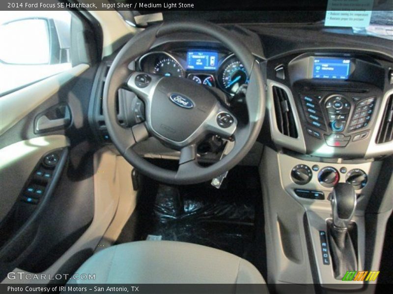 Ingot Silver / Medium Light Stone 2014 Ford Focus SE Hatchback