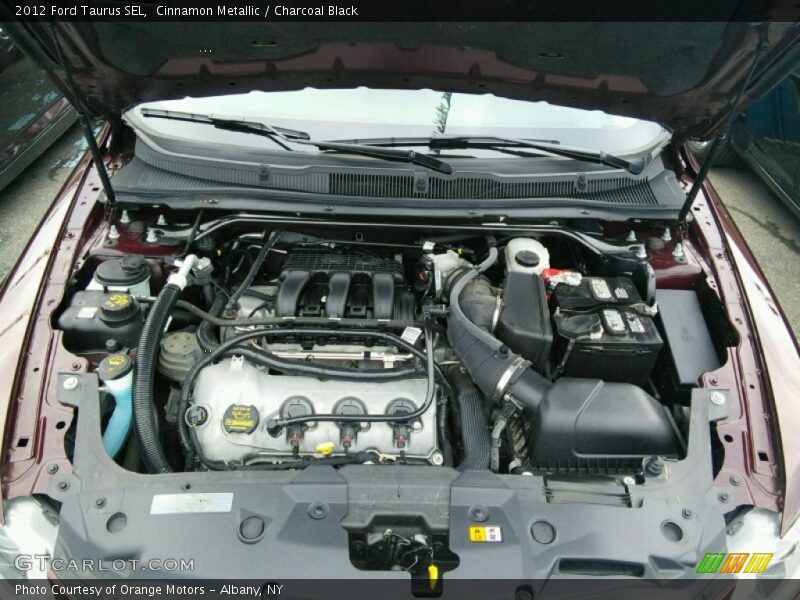 Cinnamon Metallic / Charcoal Black 2012 Ford Taurus SEL