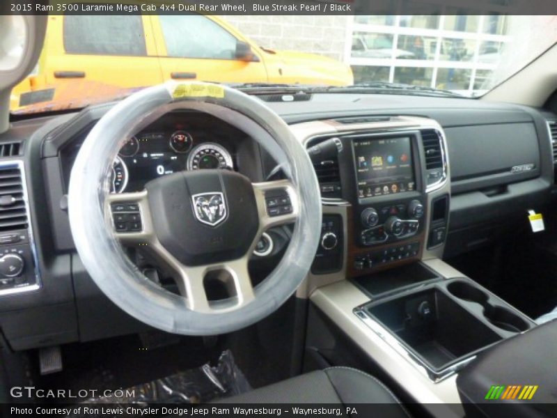 Dashboard of 2015 3500 Laramie Mega Cab 4x4 Dual Rear Wheel
