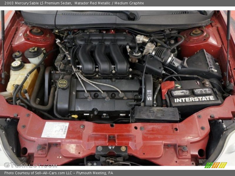 Matador Red Metallic / Medium Graphite 2003 Mercury Sable LS Premium Sedan