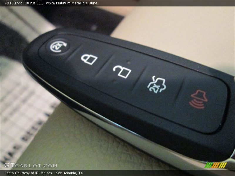 White Platinum Metallic / Dune 2015 Ford Taurus SEL