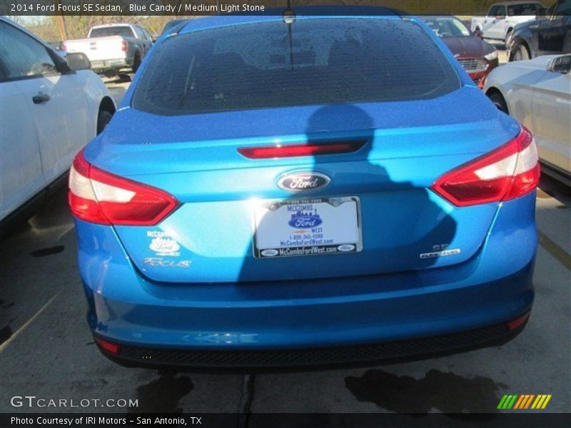 Blue Candy / Medium Light Stone 2014 Ford Focus SE Sedan