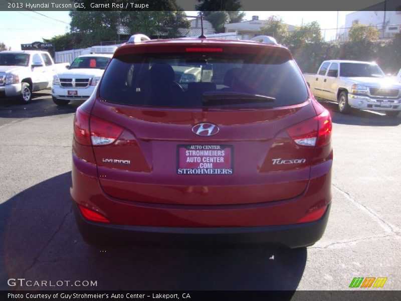 Garnet Red / Taupe 2013 Hyundai Tucson GLS