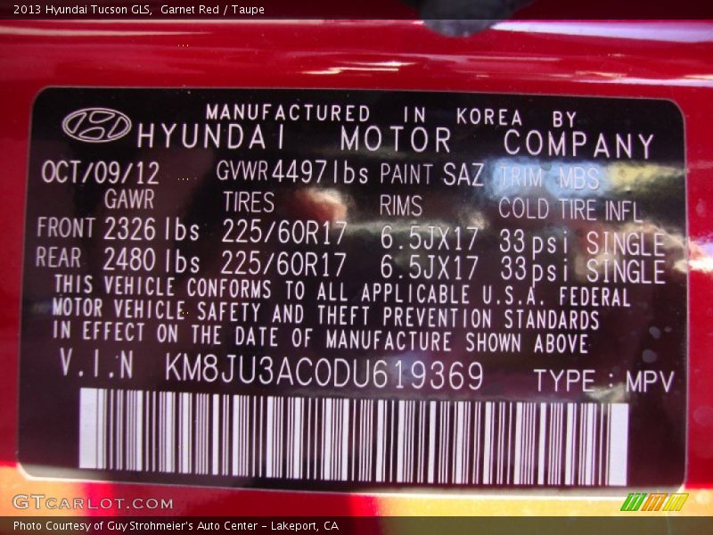 Garnet Red / Taupe 2013 Hyundai Tucson GLS