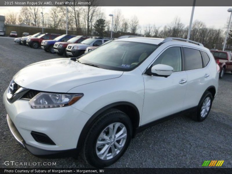 Pearl White / Almond 2015 Nissan Rogue SV AWD