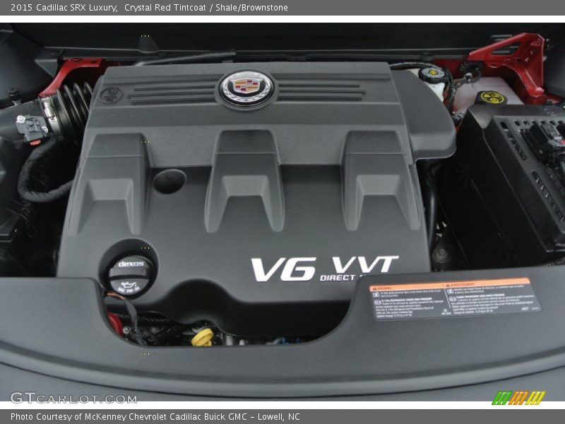Crystal Red Tintcoat / Shale/Brownstone 2015 Cadillac SRX Luxury