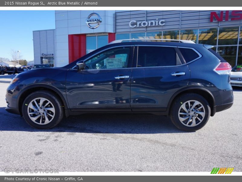 Arctic Blue Metallic / Almond 2015 Nissan Rogue SL