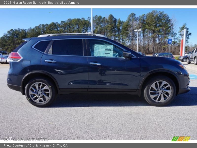 Arctic Blue Metallic / Almond 2015 Nissan Rogue SL