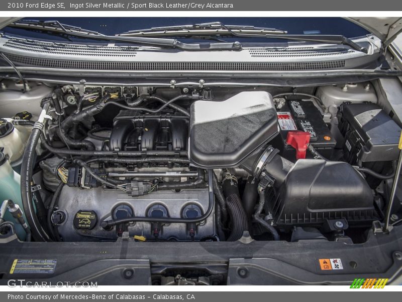 Ingot Silver Metallic / Sport Black Leather/Grey Alcantara 2010 Ford Edge SE