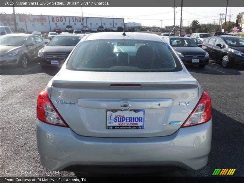 Brilliant Silver / Charcoal 2015 Nissan Versa 1.6 SV Sedan