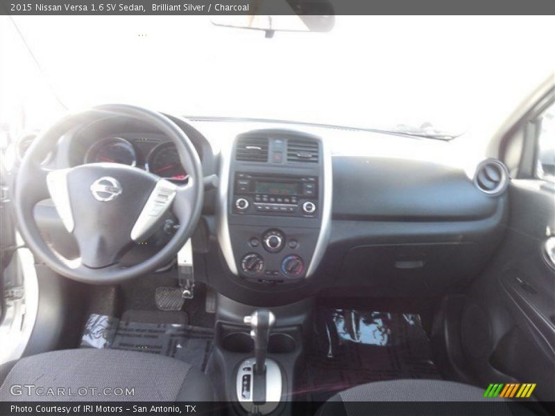 Brilliant Silver / Charcoal 2015 Nissan Versa 1.6 SV Sedan
