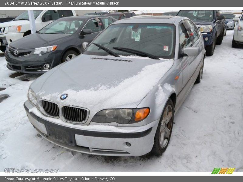 Front 3/4 View of 2004 3 Series 330xi Sedan