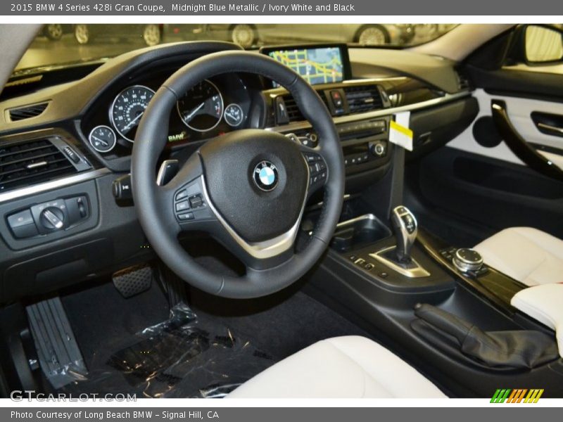 Midnight Blue Metallic / Ivory White and Black 2015 BMW 4 Series 428i Gran Coupe