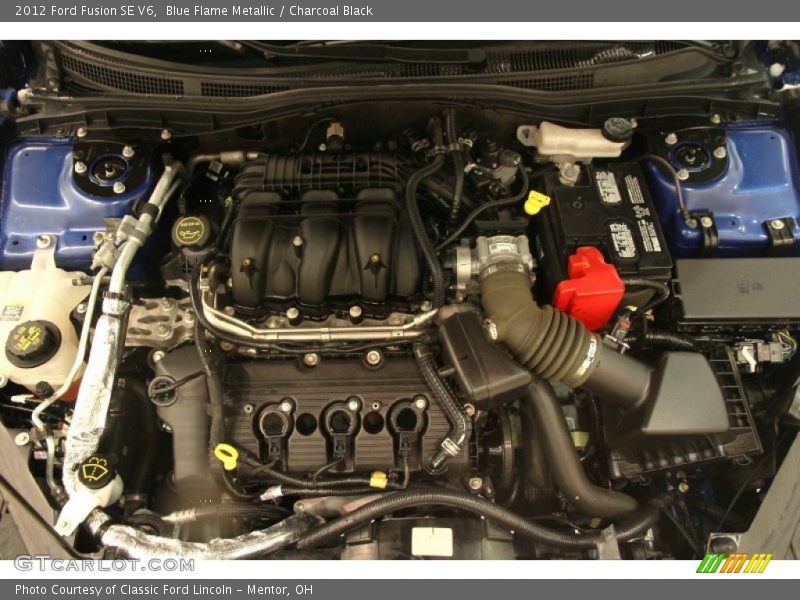 Blue Flame Metallic / Charcoal Black 2012 Ford Fusion SE V6