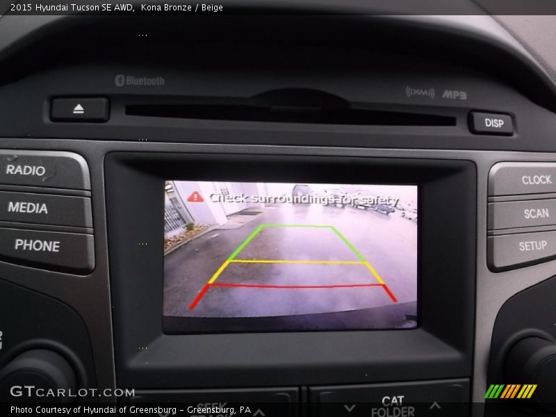 Kona Bronze / Beige 2015 Hyundai Tucson SE AWD