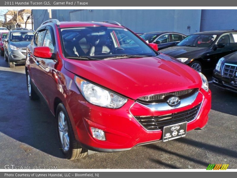 Garnet Red / Taupe 2011 Hyundai Tucson GLS