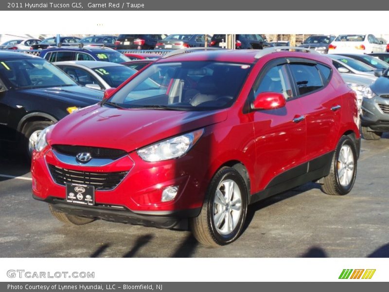 Garnet Red / Taupe 2011 Hyundai Tucson GLS