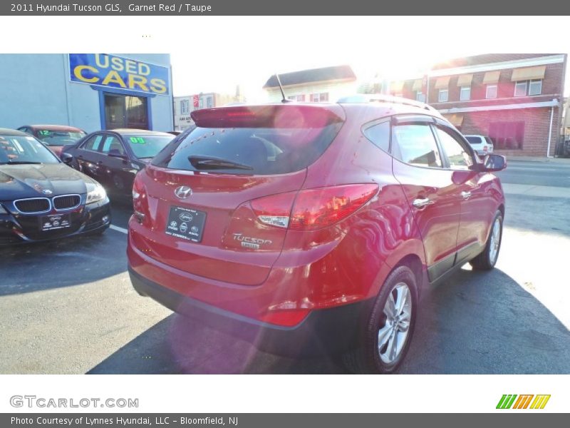 Garnet Red / Taupe 2011 Hyundai Tucson GLS