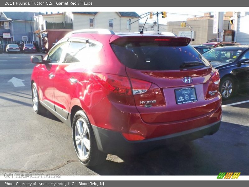 Garnet Red / Taupe 2011 Hyundai Tucson GLS