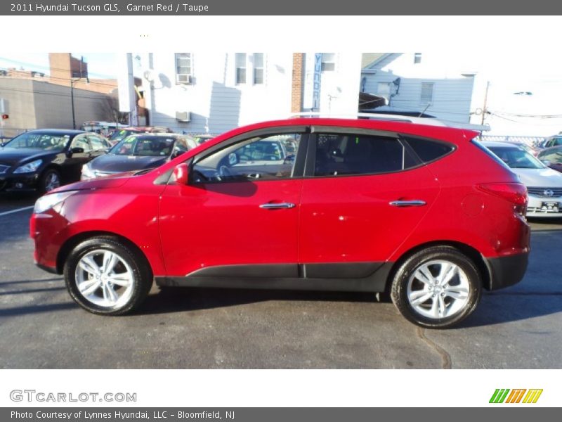 Garnet Red / Taupe 2011 Hyundai Tucson GLS