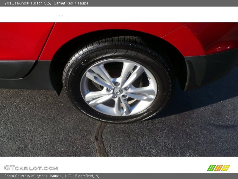 Garnet Red / Taupe 2011 Hyundai Tucson GLS