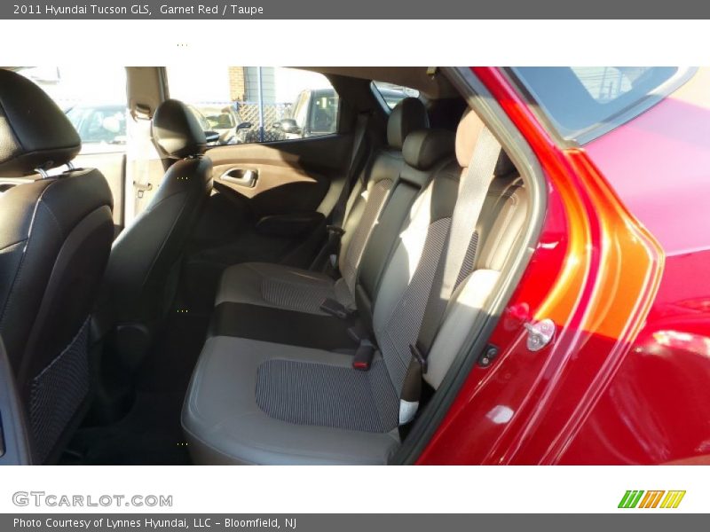 Garnet Red / Taupe 2011 Hyundai Tucson GLS