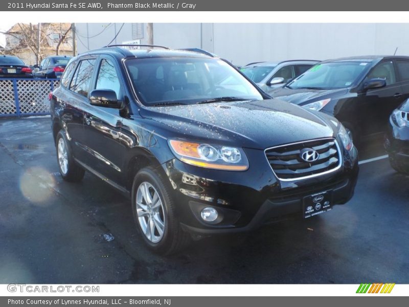Phantom Black Metallic / Gray 2011 Hyundai Santa Fe SE AWD