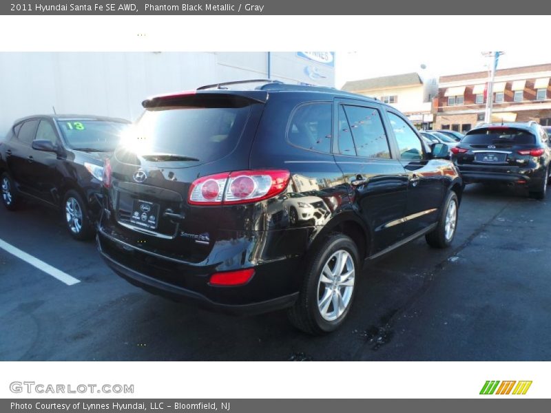 Phantom Black Metallic / Gray 2011 Hyundai Santa Fe SE AWD