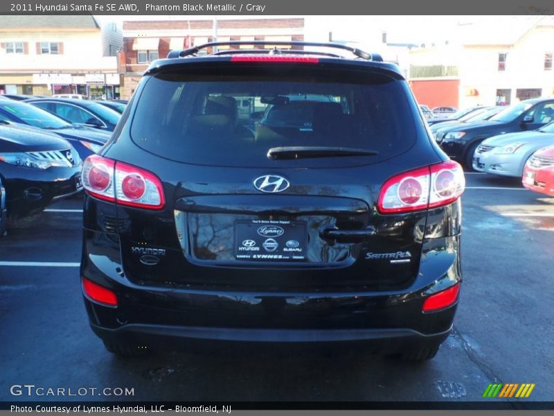 Phantom Black Metallic / Gray 2011 Hyundai Santa Fe SE AWD