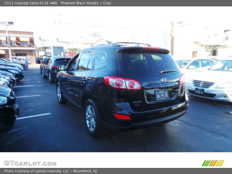 Phantom Black Metallic / Gray 2011 Hyundai Santa Fe SE AWD