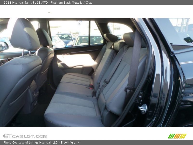 Phantom Black Metallic / Gray 2011 Hyundai Santa Fe SE AWD