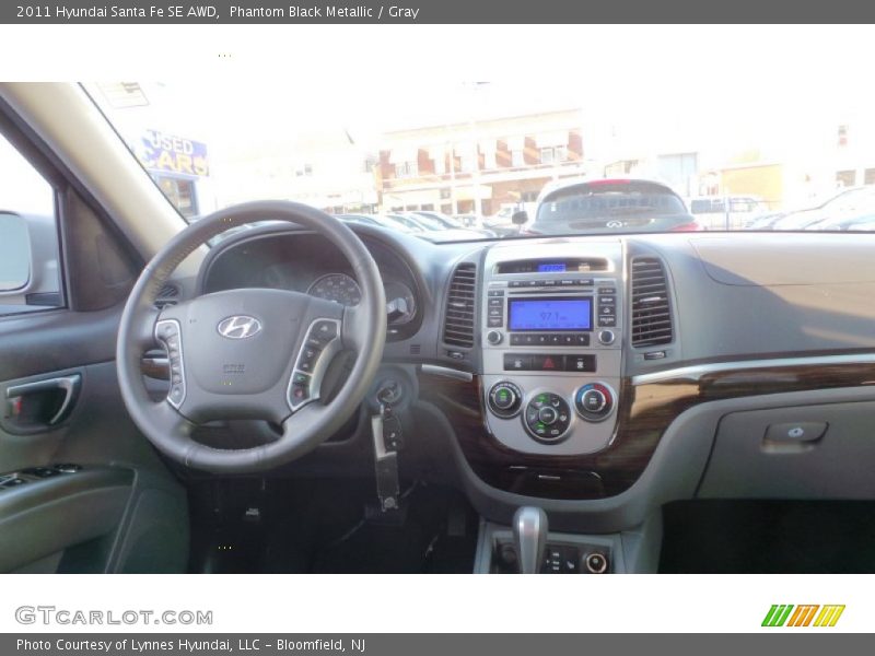 Phantom Black Metallic / Gray 2011 Hyundai Santa Fe SE AWD